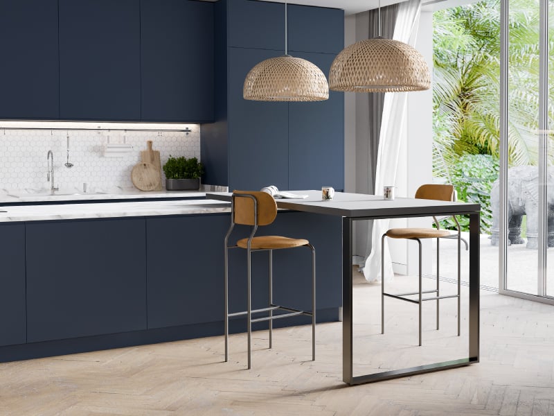 Navy modular kitchen with peninsula table